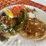Three tacos, al pastor and suadero protein; included salsa and sides as toppings