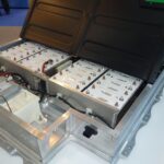 an electric vehicle battery pack sitting in a display