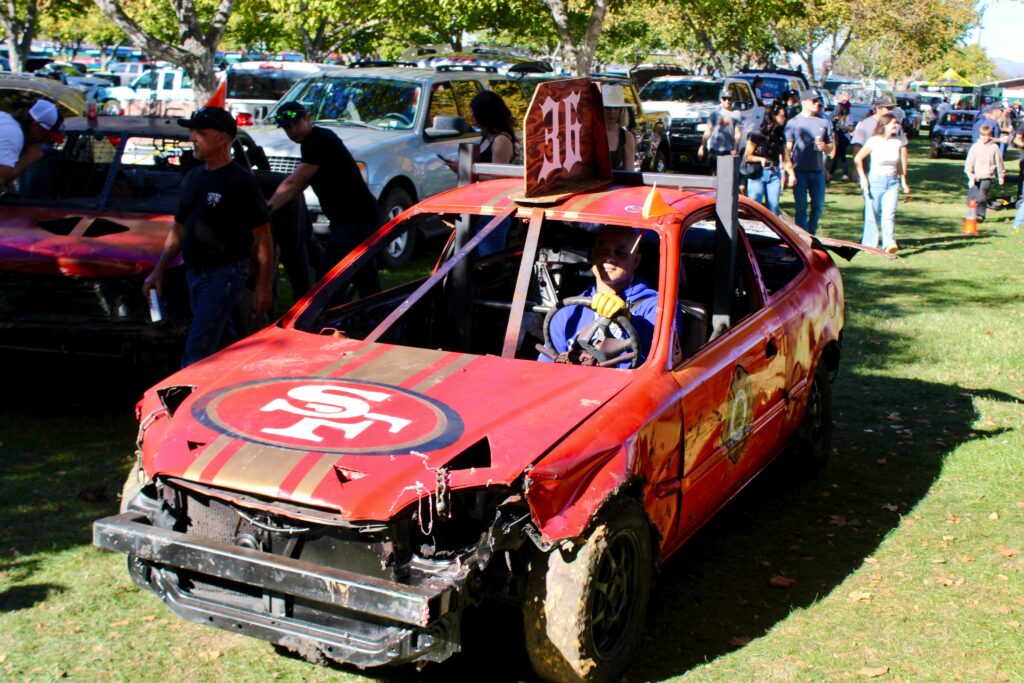 smashed up car returns from demolition derby