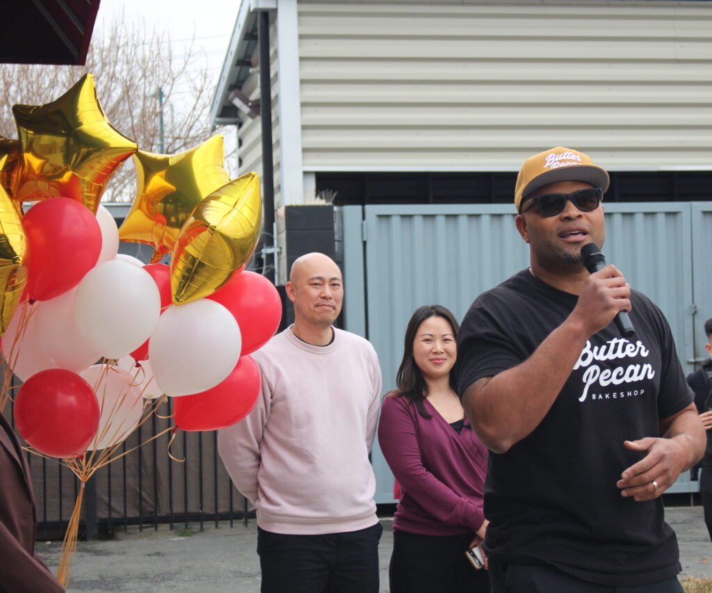 Wendell Hunter speaks into microphone