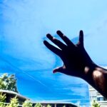 Student waving.